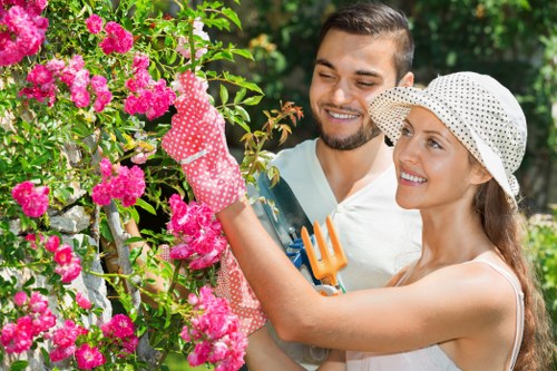 Green waste and recyclable materials sorted on a landscaping site